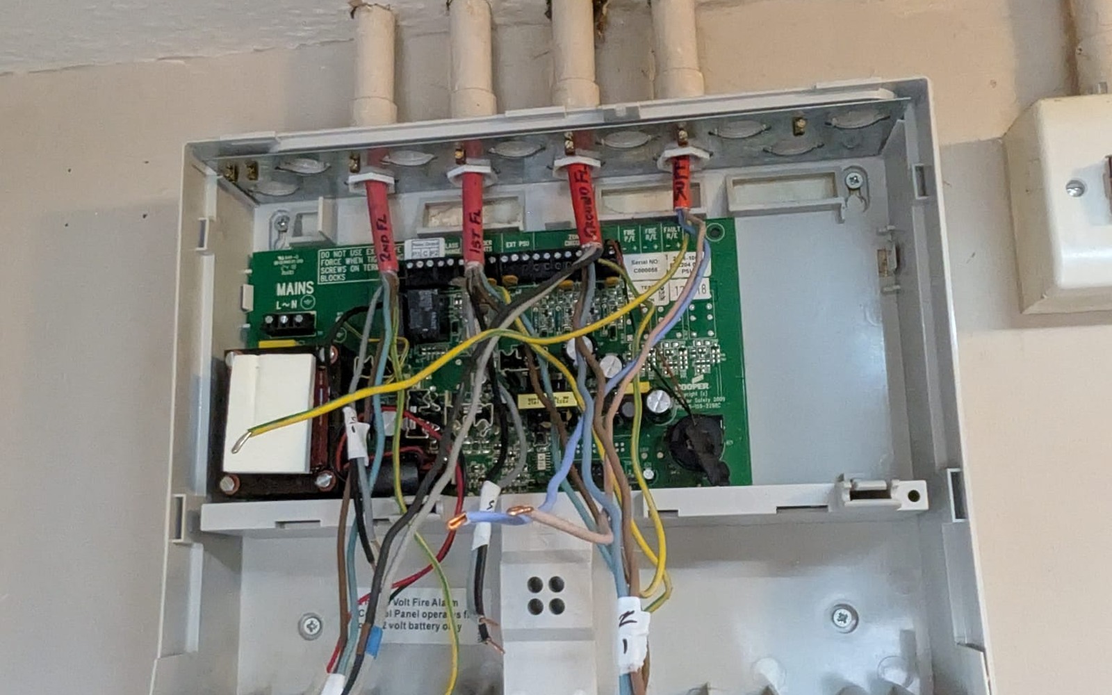 Existing wired security panel inspected during a NOX takeover assessment