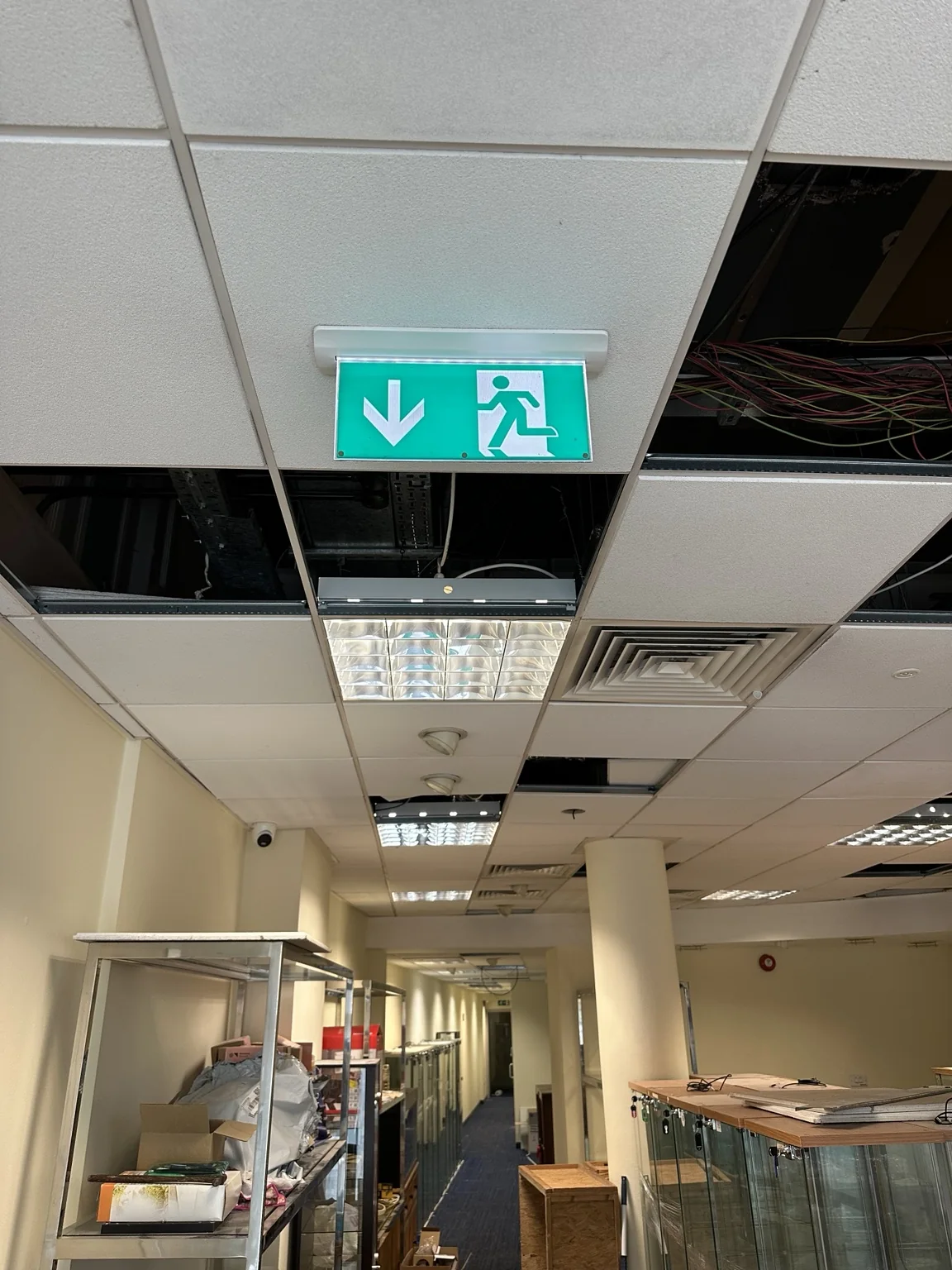 Emergency exit lighting installed at a commercial premises