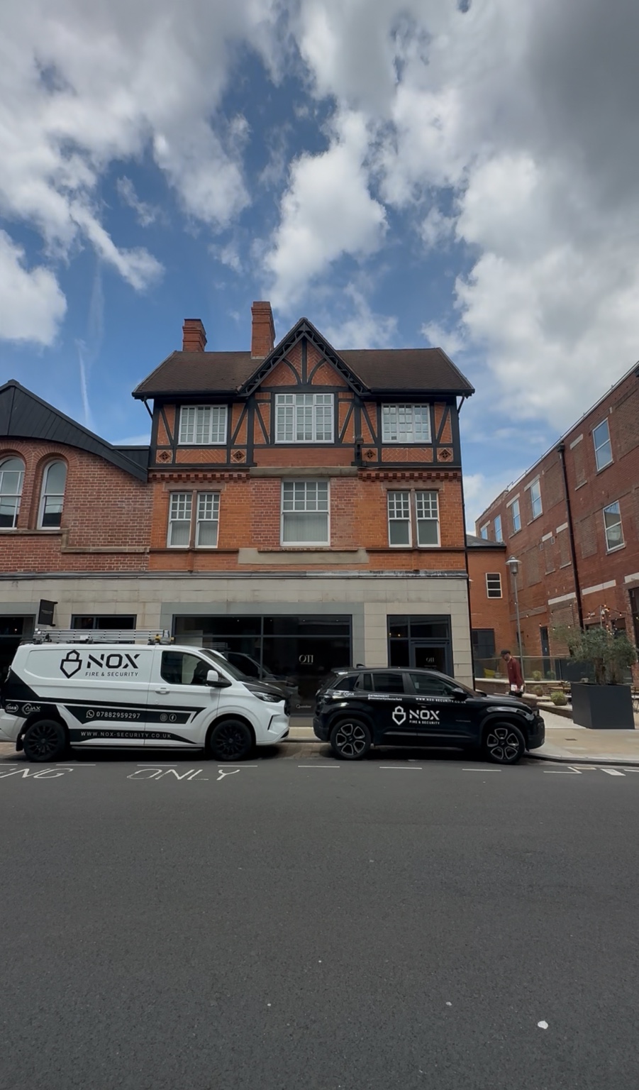 NOX Fire and Security vehicles outside a Chesterfield commercial project