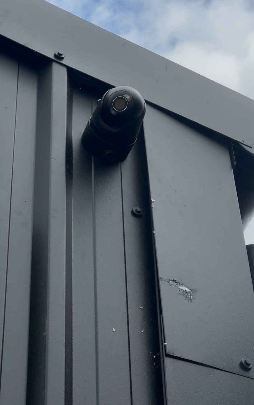 Black external CCTV camera at The Tan Station