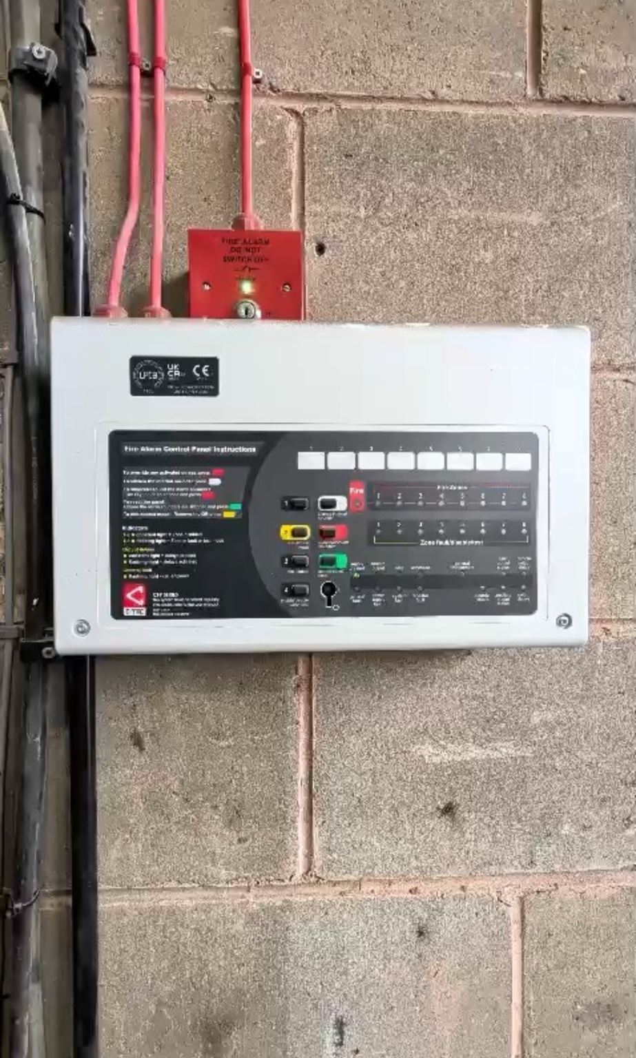 Traditional commercial fire alarm panel during planned servicing