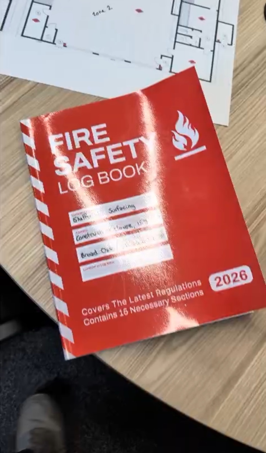 Fire safety logbook and plans used for coordinated compliance support