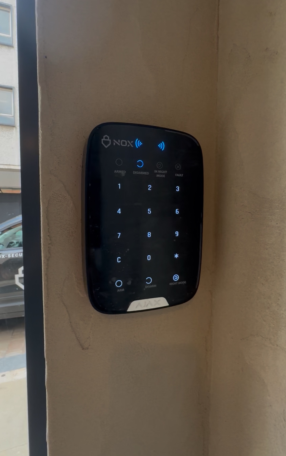 NOX branded Ajax keypad installed at a commercial premises