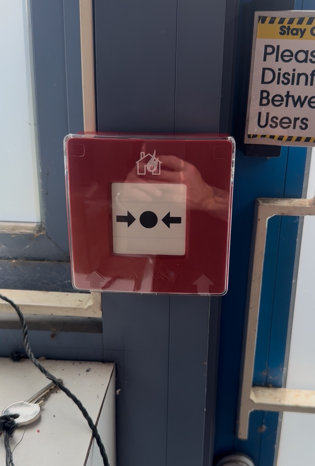Close view of a manual fire call point at Telesis