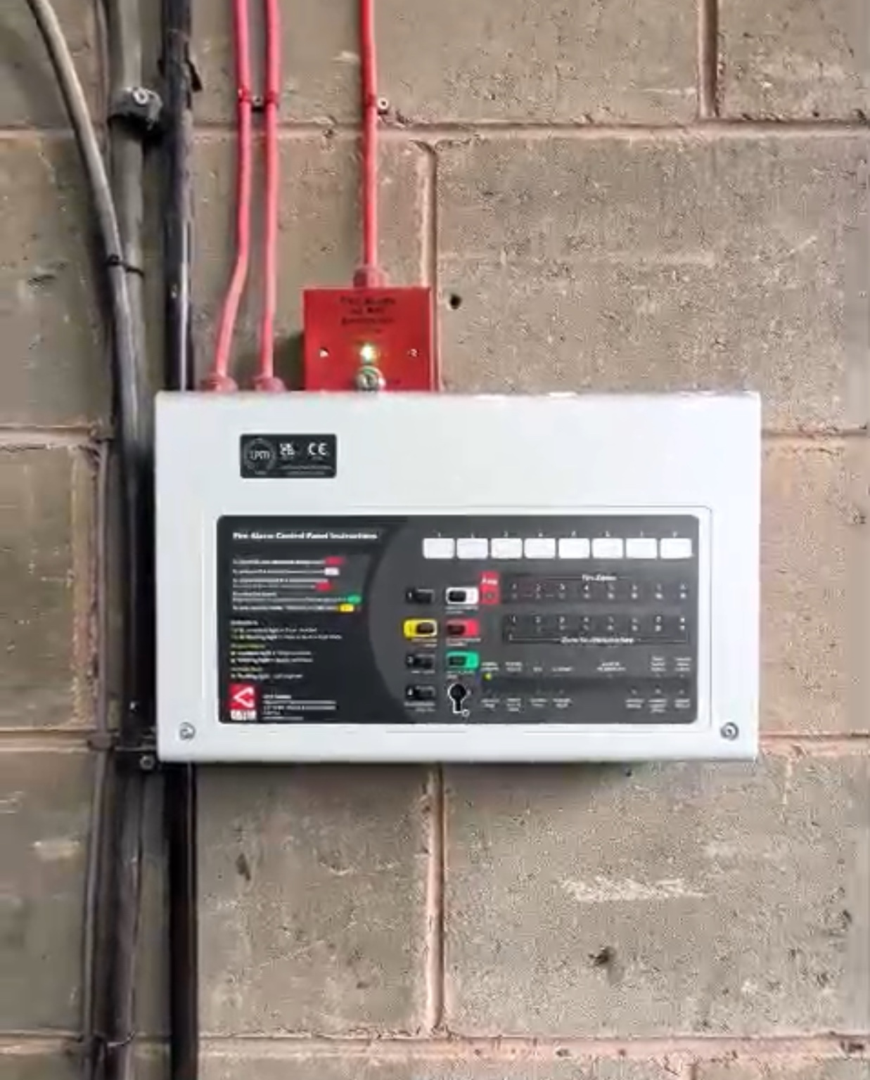 Commercial fire alarm control panel inspected during planned servicing